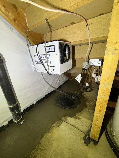 Solution Contre l'Infiltration d'Eau au Sous-Sol avec le Système de Drain Intérieur à Mascouche, QC