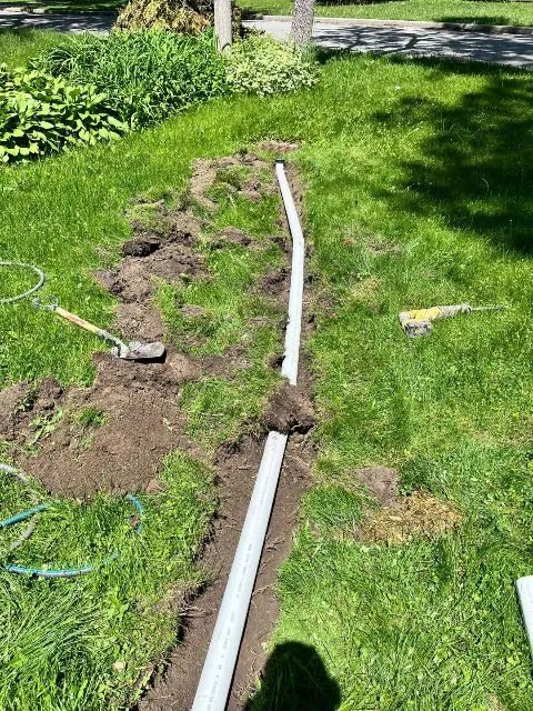 Imperméabilisation et installation d'un drain intérieur au sous-sol à Saint-Sulpice, QC