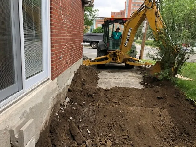 Solution to Foundation Waterproofing Problem from Outside in Sainte-Dorothée, QC. Before