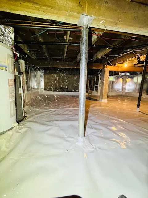 Problèmes d'humidité et de renforcement identifiés dans le vide sanitaire à Montréal, QC